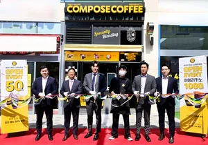 9살 컴포즈커피, 가맹점 2000호점 오픈