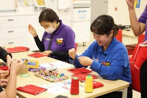 레고랜드 코리아, 임직원 직접 제작한 생리대 파우치 기부