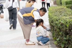 국민은행, 부산 광안리 해수욕장서 플로깅 행사