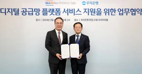 우리은행은 지난 26일 서울 중구 우리은행 본점에서 한국경영혁신중소기업협회와 업무협약을 체결했다. 조병규 우리은행장(오른쪽)과 석용찬 한국경영혁신중소기업협회 협회장이 기념사진을 촬영했다. [출처: 우리은행]