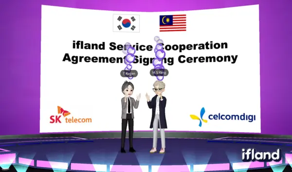 ‘이프랜드’에서 말레이시아 셀콤 디지 쿠칸 티루나바카라스 CIO(왼쪽), SKT 양맹석 메타버스 CO 담당(오른쪽)이 계약 체결 세레모니를 진행하는 모습