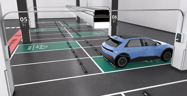 주차면 상부 중앙에 구축된 광폭 케이블 덕트를 통해 전기차 충전기를 설치한 모습 (사진제공. 현대건설)