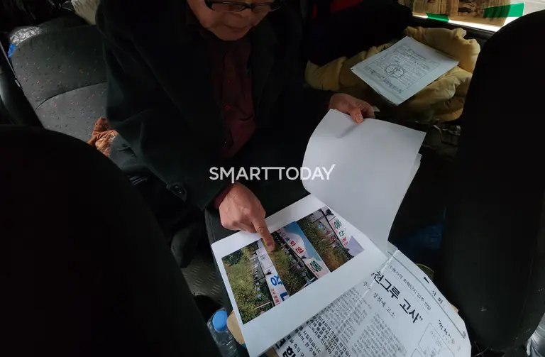 최모씨가 차량 내부에서 기자와 인터뷰를 진행하고 있다. 출처=김종현 기자