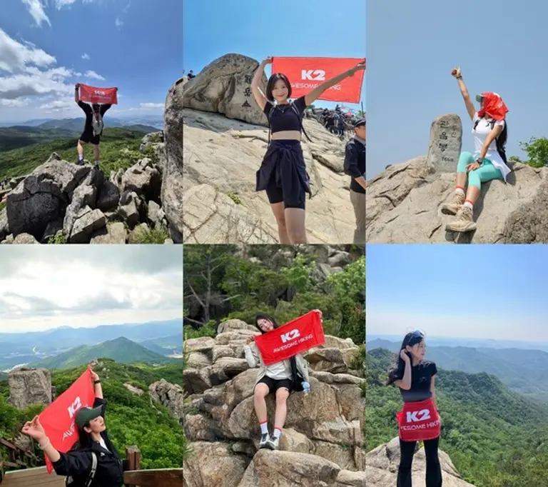 K2 ‘2025 어썸하이킹’에 참여한 참가자들이 산 정상에서 하이킹 미션 인증샷을 남기며 산행의 즐거움을 공유했다.(사진제공=K2)